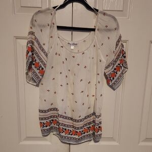 Chic White and Orange Patterned Blouse